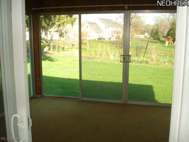 7713 McCreary Road Independence, OH 44131 - Photo 16 of 20 Enclosed Patio