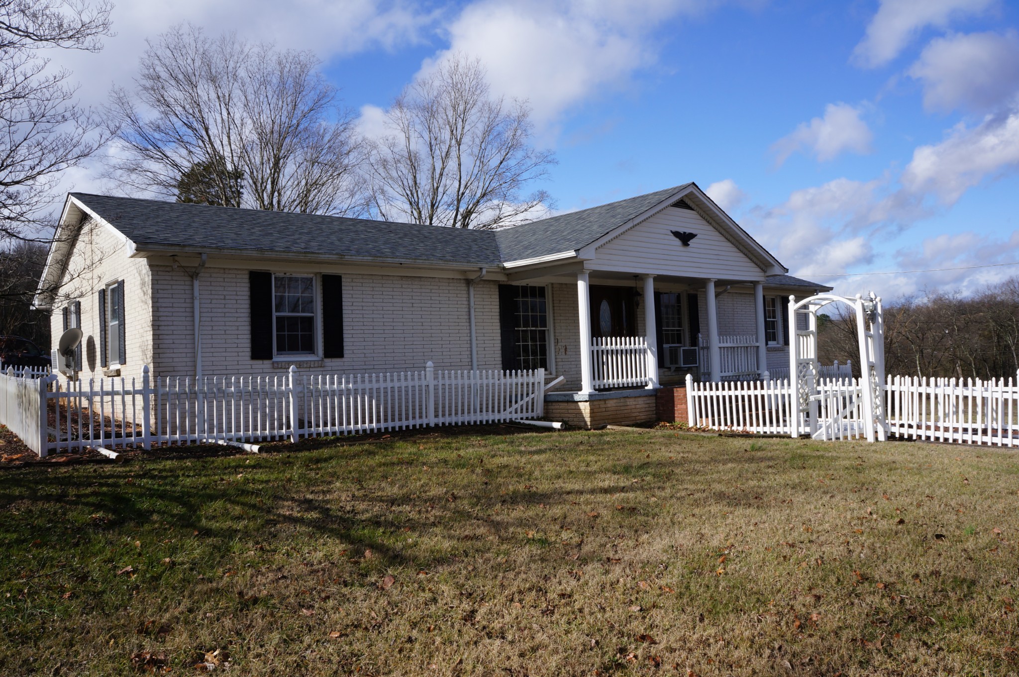 500 Shuler Branch Road Ethridge, TN 38456 - Photo 3 of 27 a front view of a house with a garden