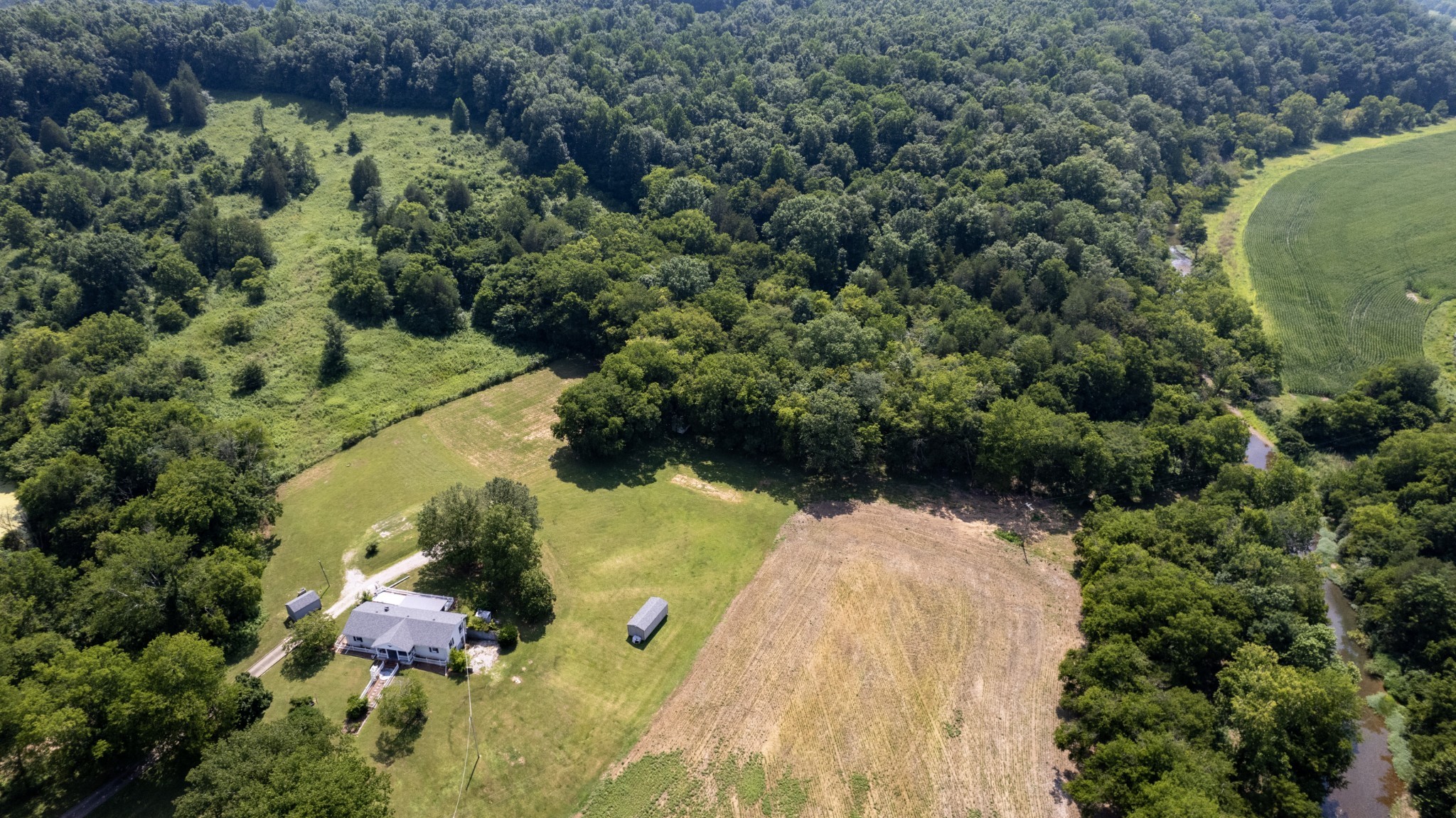 500 Shuler Branch Road Ethridge, TN 38456 - Photo 5 of 27 an aerial view of residential house with outdoor space and swimming pool