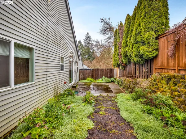 a backyard of a house with lots of green space