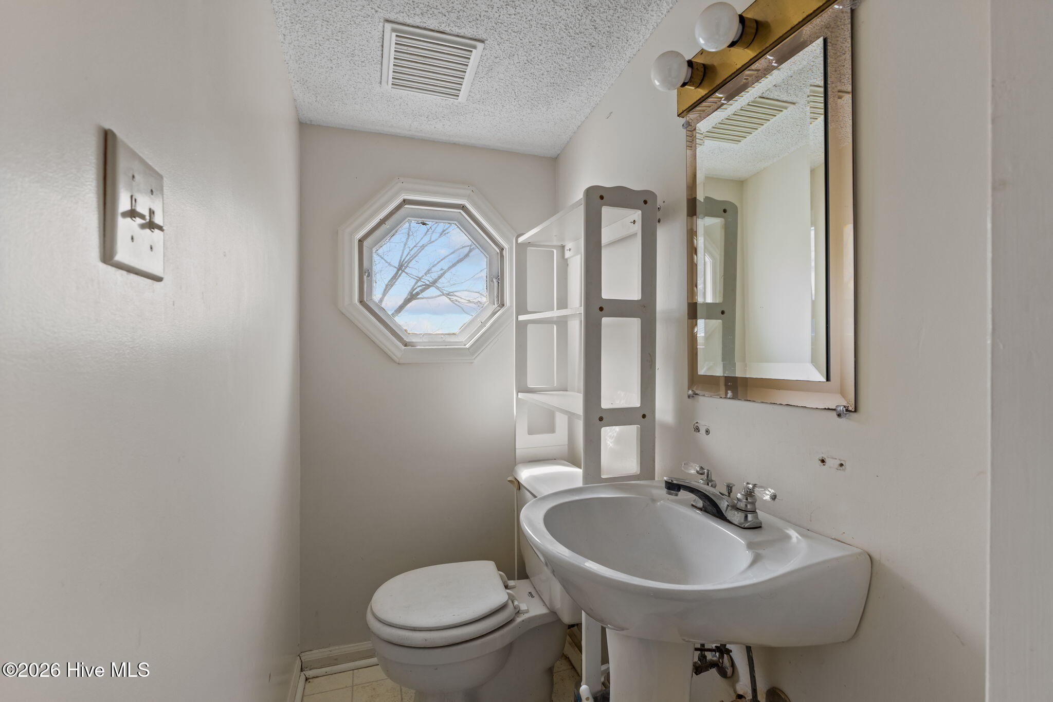 319 Old Causeway Road Atlantic Beach, NC 28512 - Photo 25 of 45 Half bath on second floor