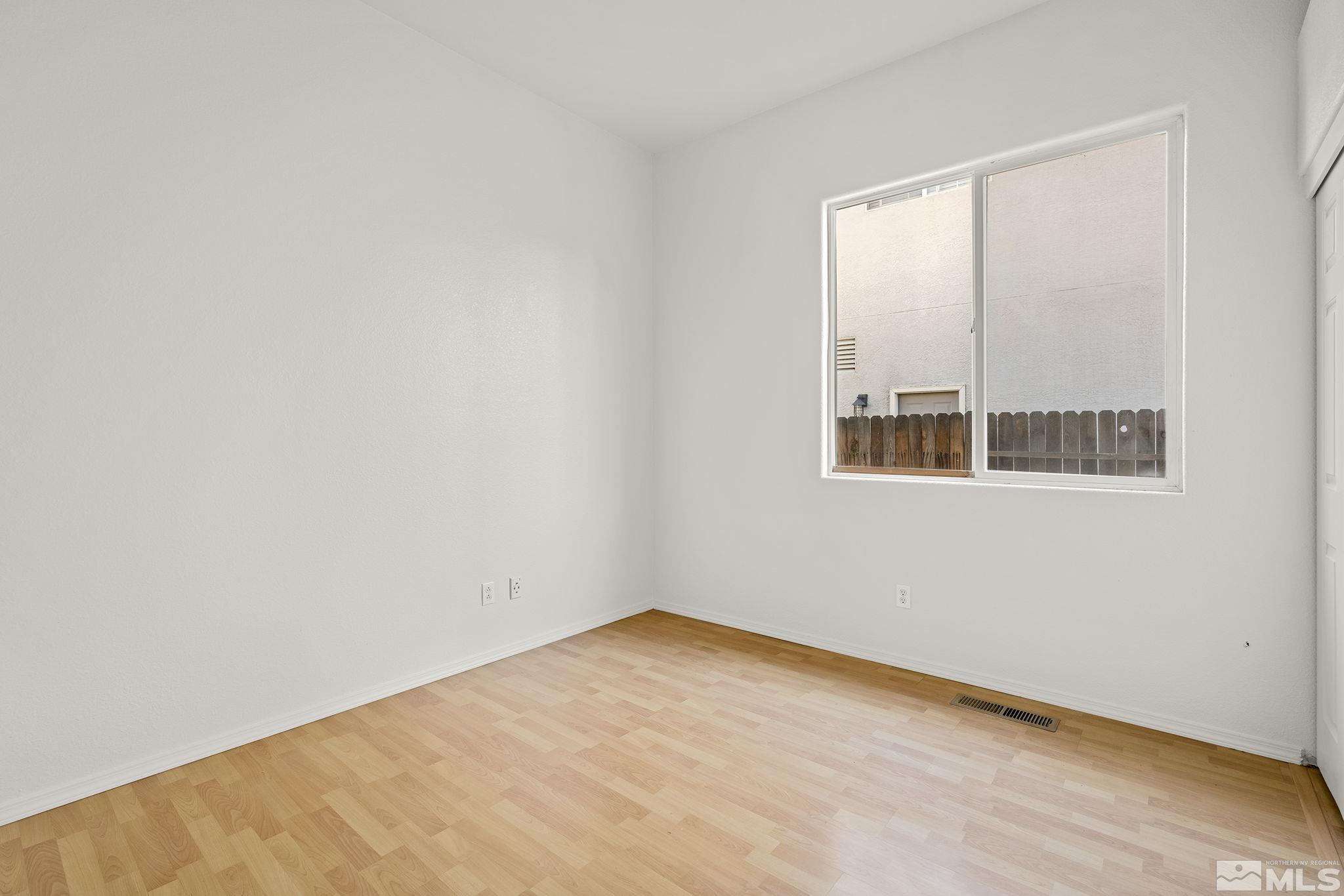 9671 Comanche Moon Drive Reno, NV 89521 - Photo 14 of 18 an empty room with a window
