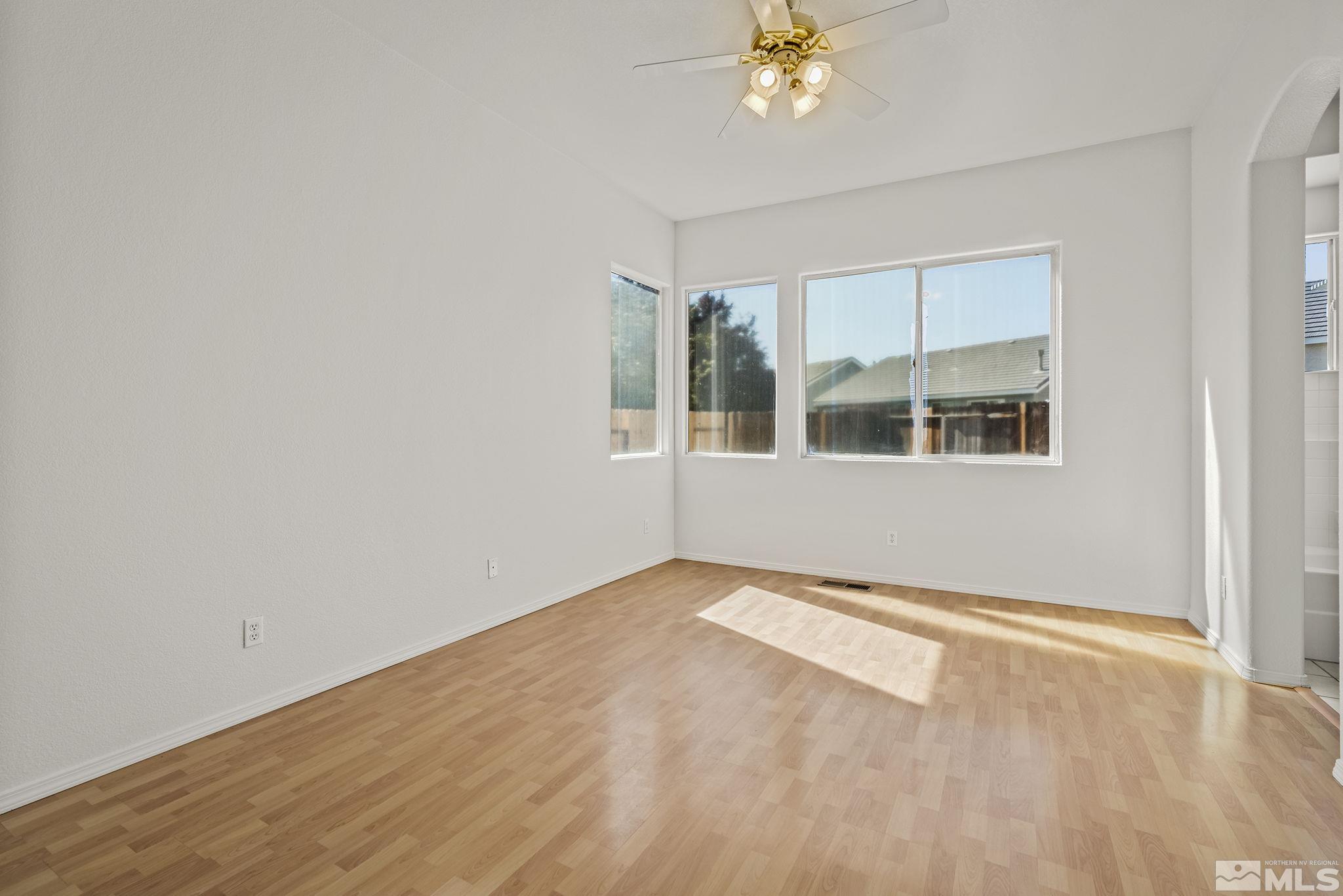 9671 Comanche Moon Drive Reno, NV 89521 - Photo 10 of 18 a view of an empty room with a window