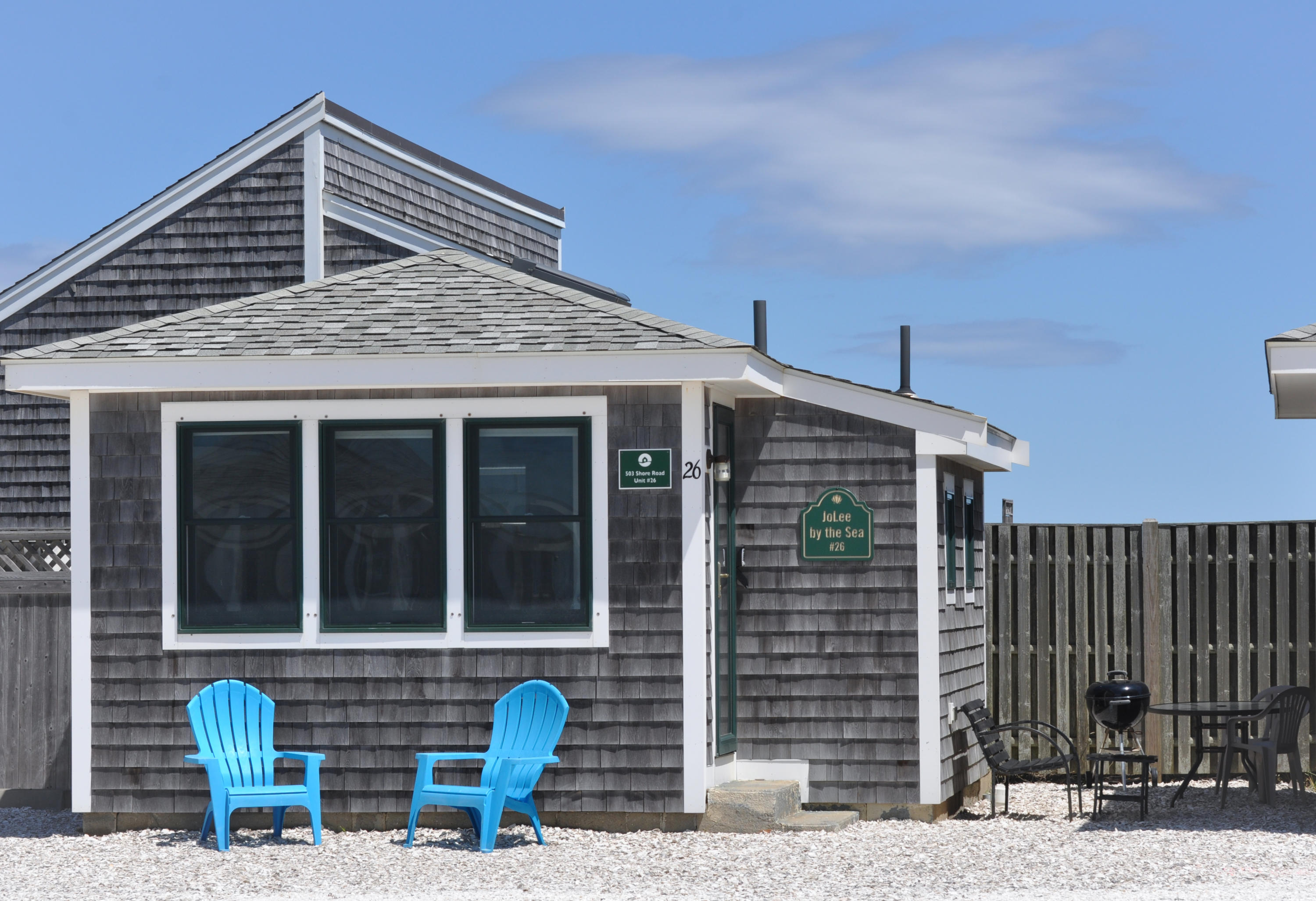 503 Shore Road, Unit 26 Truro, MA 02666 - Photo 1 of 17 a front view of a house with glass windows