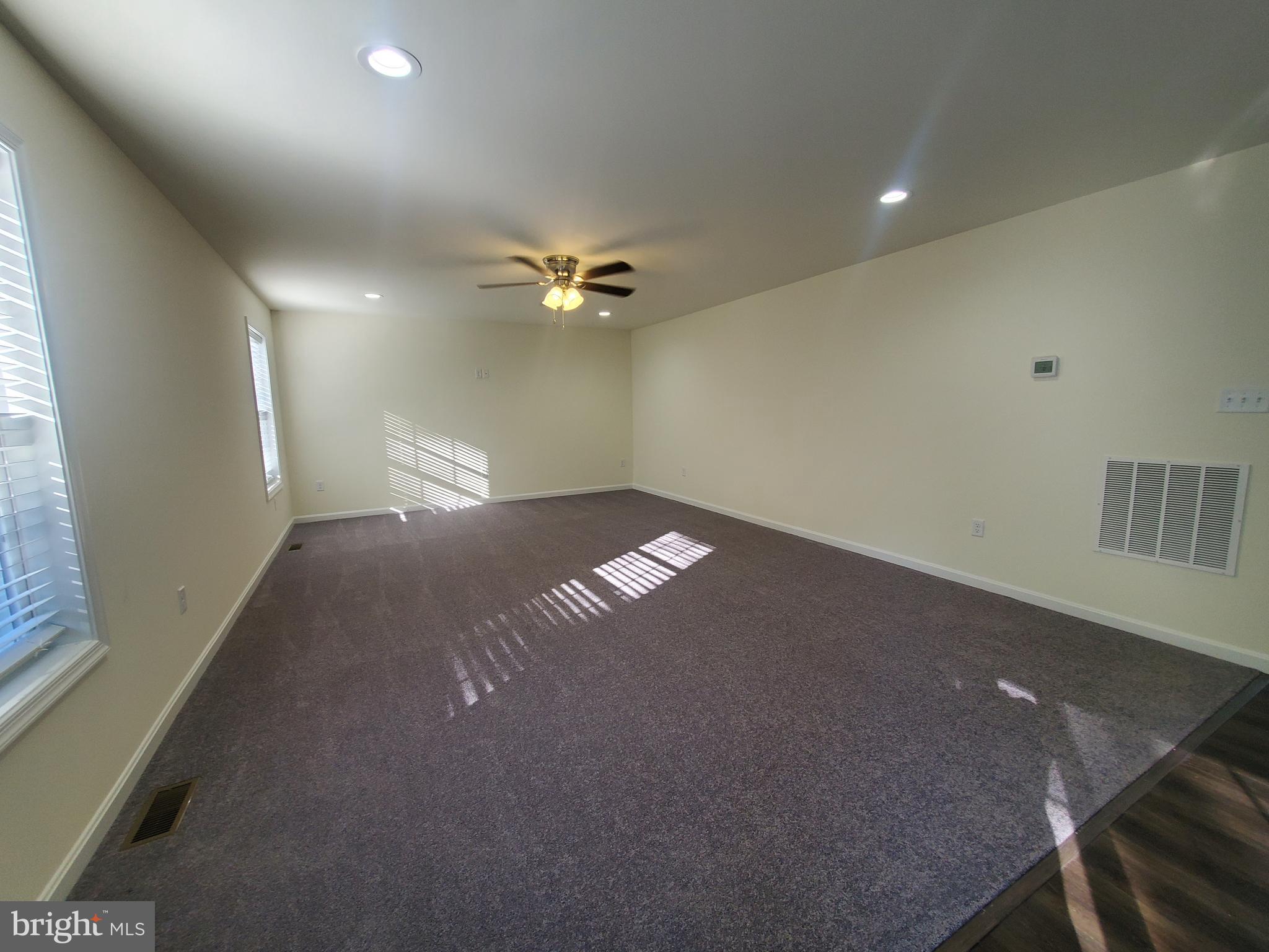 205 Cilento Drive Magnolia, DE 19962 - Photo 24 of 46 a view of an empty room with a window