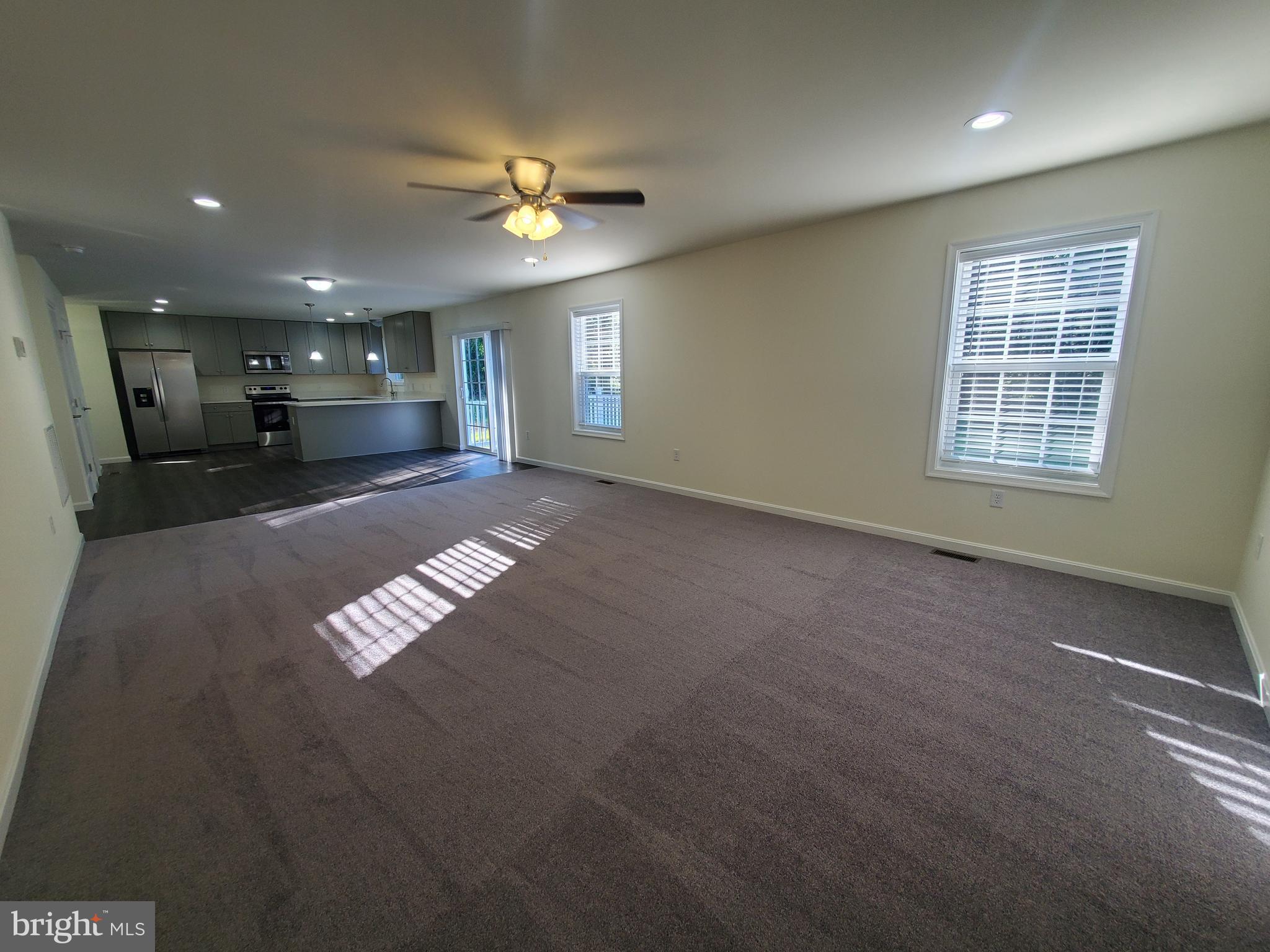 205 Cilento Drive Magnolia, DE 19962 - Photo 25 of 46 a view of an empty room with a window