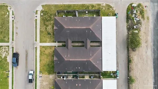 aerial view of house with yard