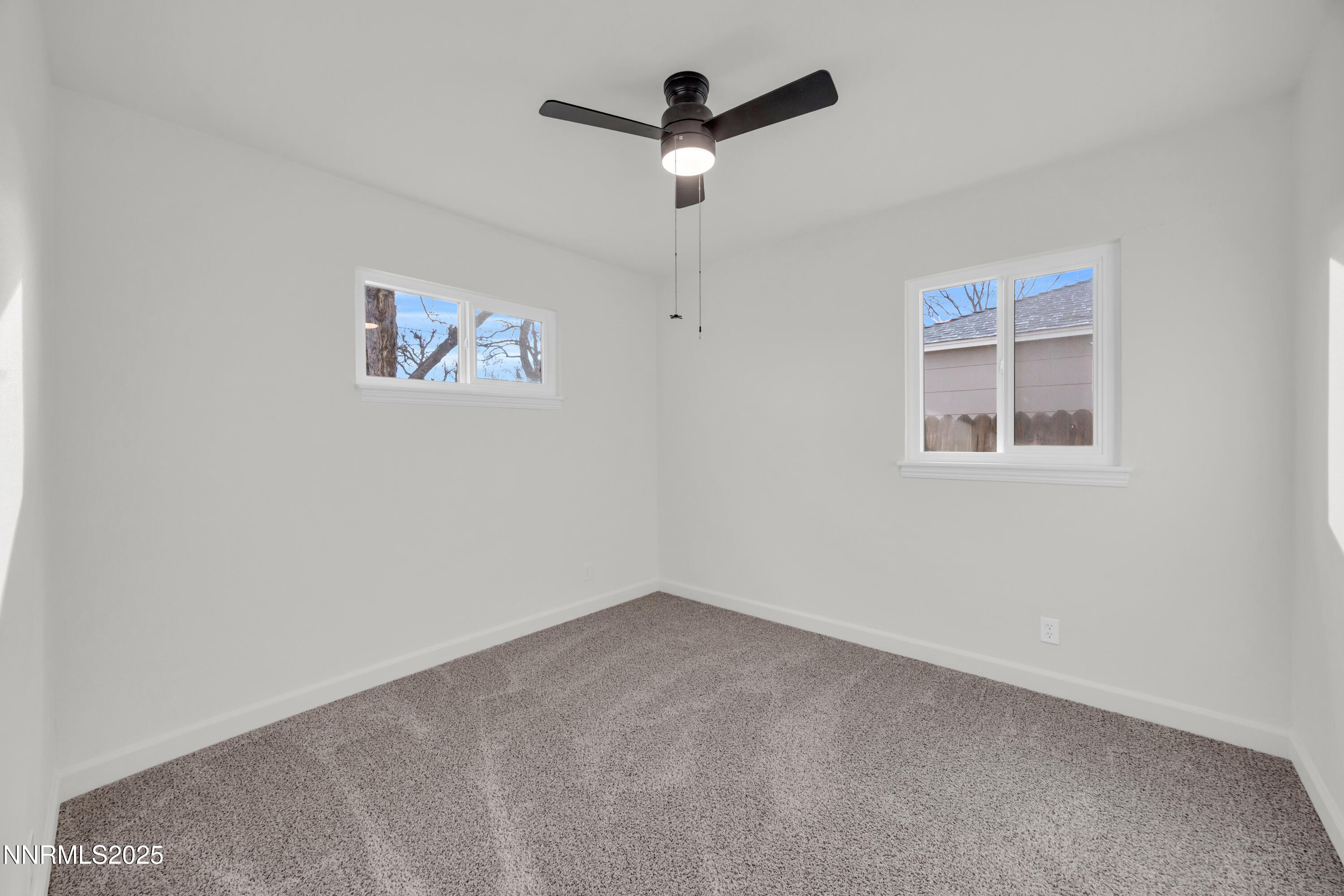705 York Way Sparks, NV 89431 - Photo 14 of 17 an empty room with a window