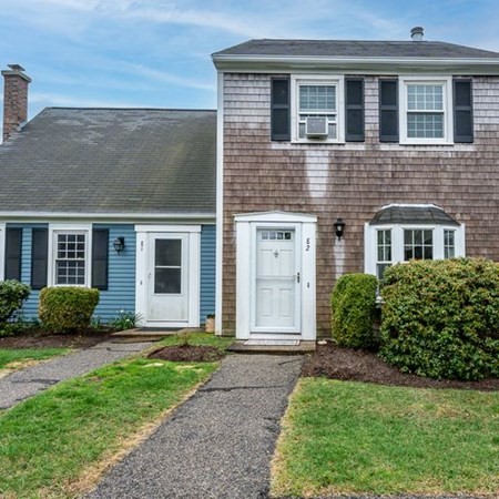 36 Atkins Road, Unit E2 Sandwich, MA 02537 - Photo 1 of 21 a view of a house with a yard