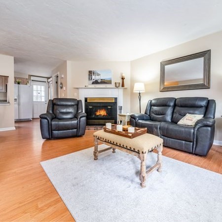 36 Atkins Road, Unit E2 Sandwich, MA 02537 - Photo 3 of 21 a living room with furniture and a fireplace