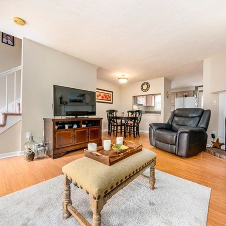 36 Atkins Road, Unit E2 Sandwich, MA 02537 - Photo 4 of 21 a living room with furniture and a flat screen tv