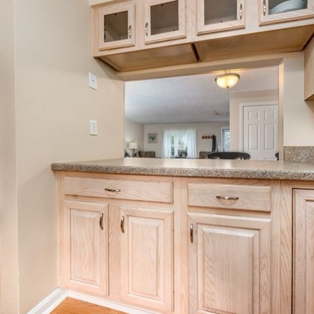 36 Atkins Road, Unit E2 Sandwich, MA 02537 - Photo 9 of 21 a bathroom with a granite countertop sink and a mirror
