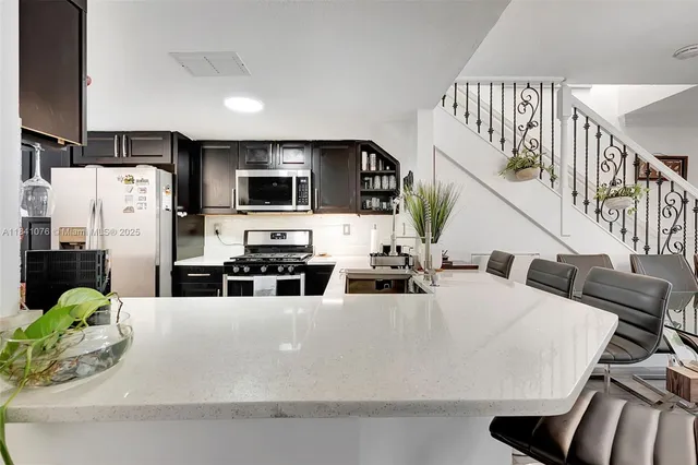 $440,000 | 1187 Northwest 123rd Place, Unit 204, Miami, FL 33182