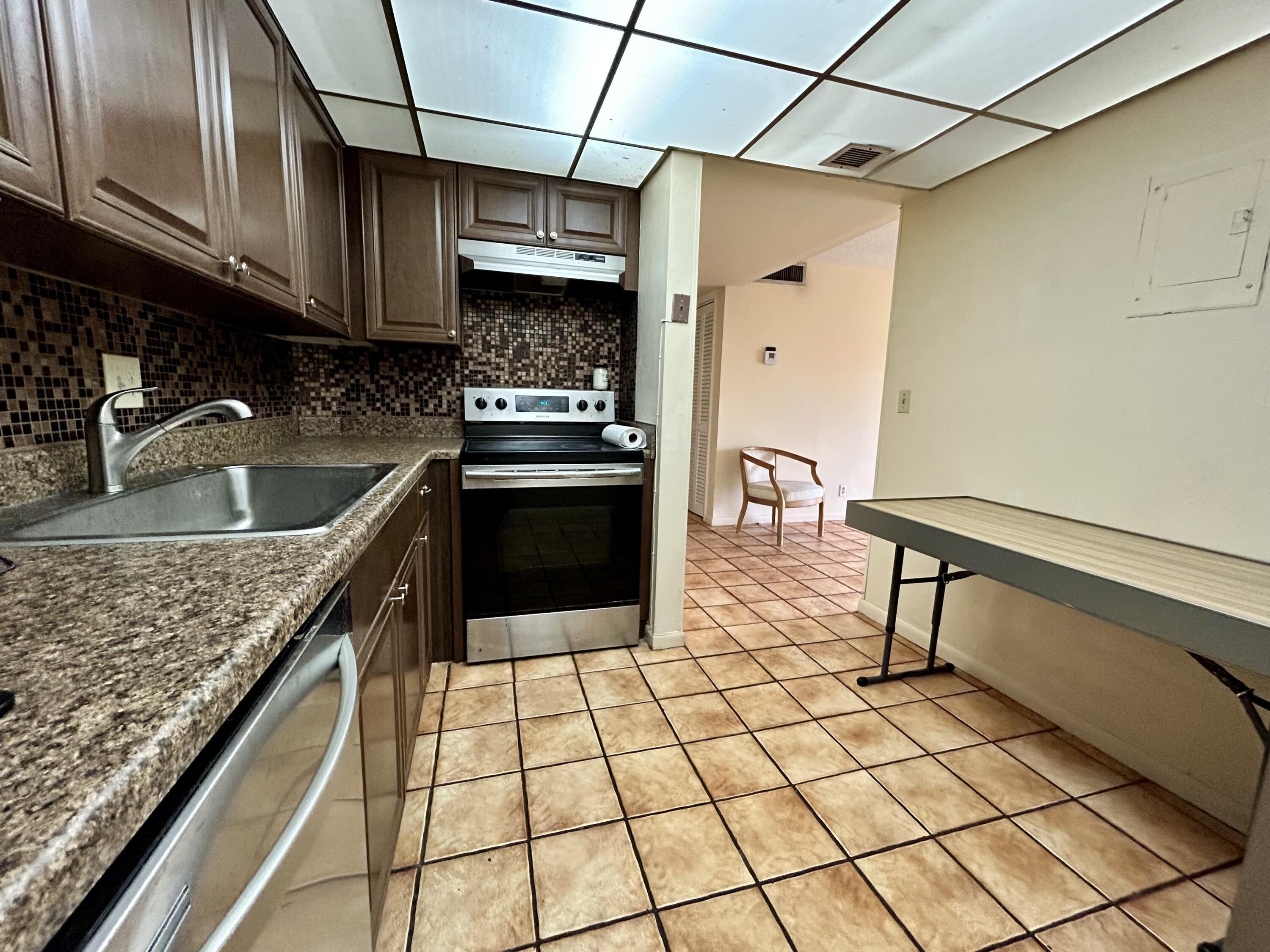 642 Northwest 13th Street, Unit 35 Boca Raton, FL 33486 - Photo 5 of 11 IMG_1751