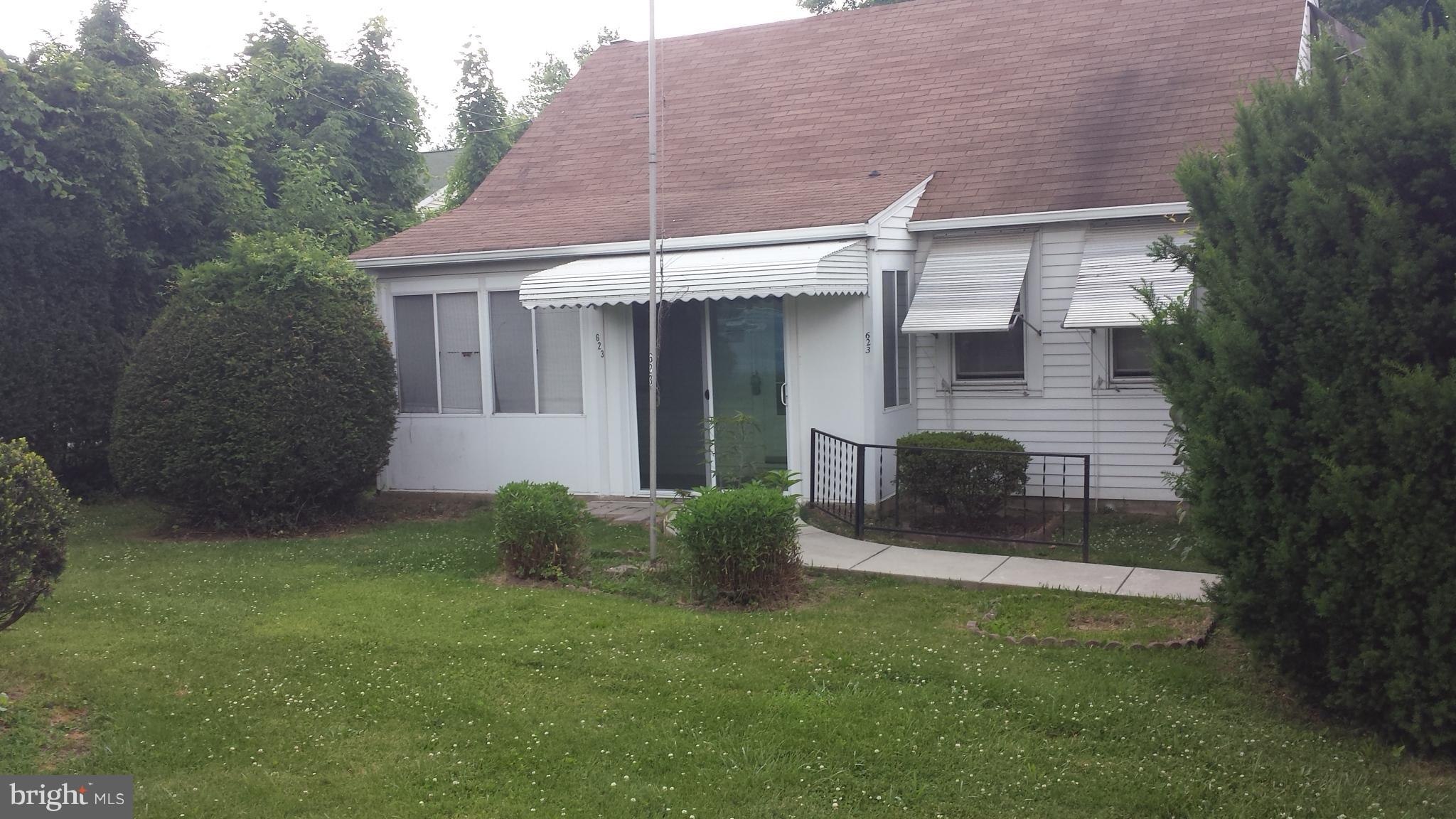 623 Edgewood Road Edgewood, MD 21040 - Photo 1 of 19 a front view of a house with garden