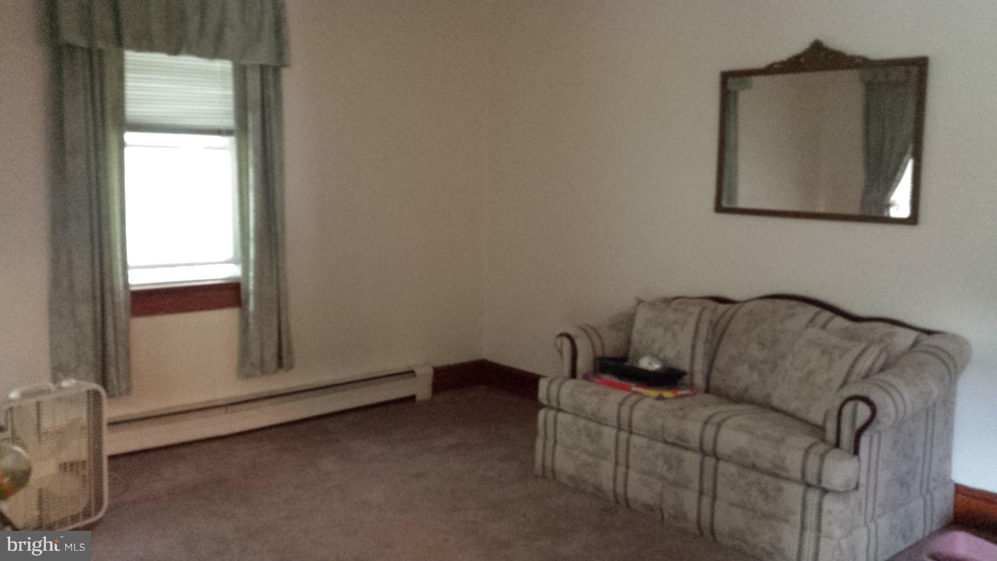 623 Edgewood Road Edgewood, MD 21040 - Photo 2 of 19 a living room with furniture and a window