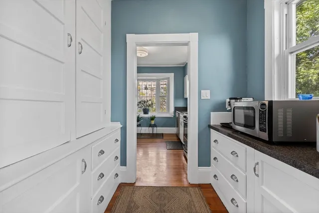 a view of living room with furniture and flat screen tv