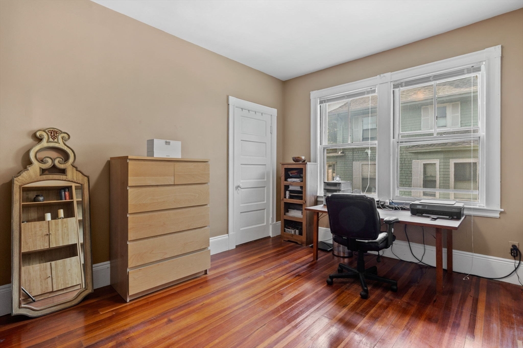 13 Cedar Hill Terrace, Unit 2 Swampscott, MA 01907 - Photo 22 of 34 a view of a workspace with furniture and a window