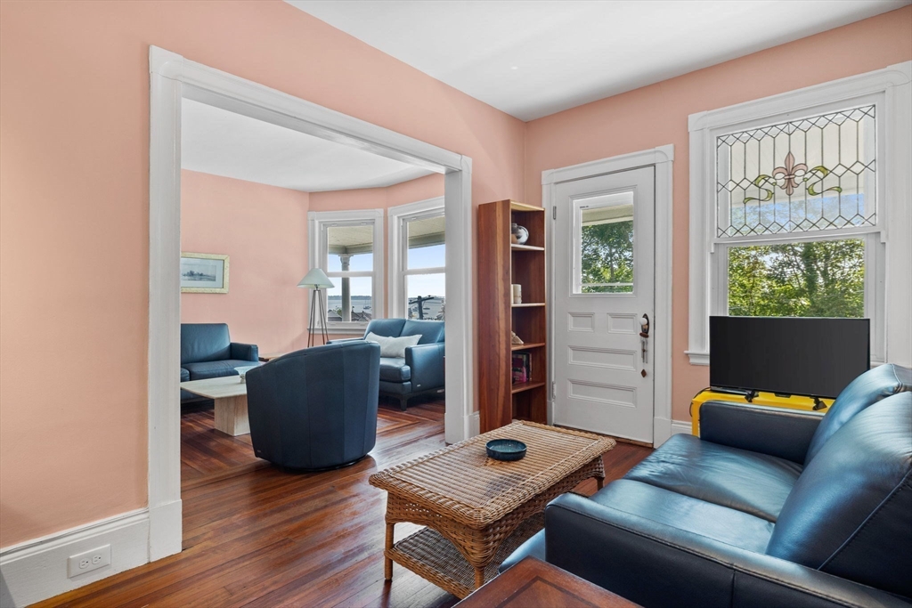 13 Cedar Hill Terrace, Unit 2 Swampscott, MA 01907 - Photo 6 of 34 a living room with furniture and a window