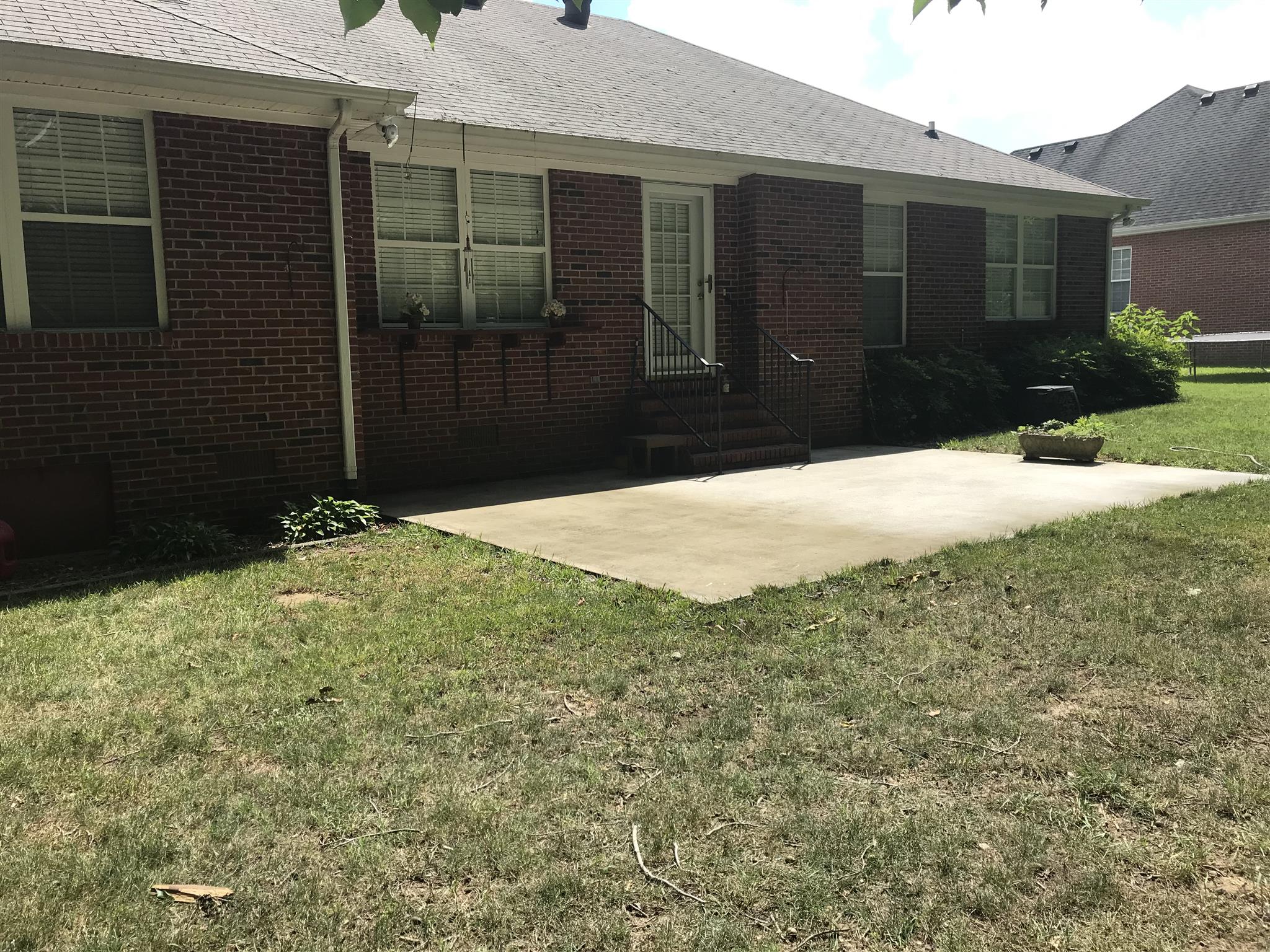 349 Duck River Road Manchester, TN 37355 - Photo 11 of 18 a backyard of a house