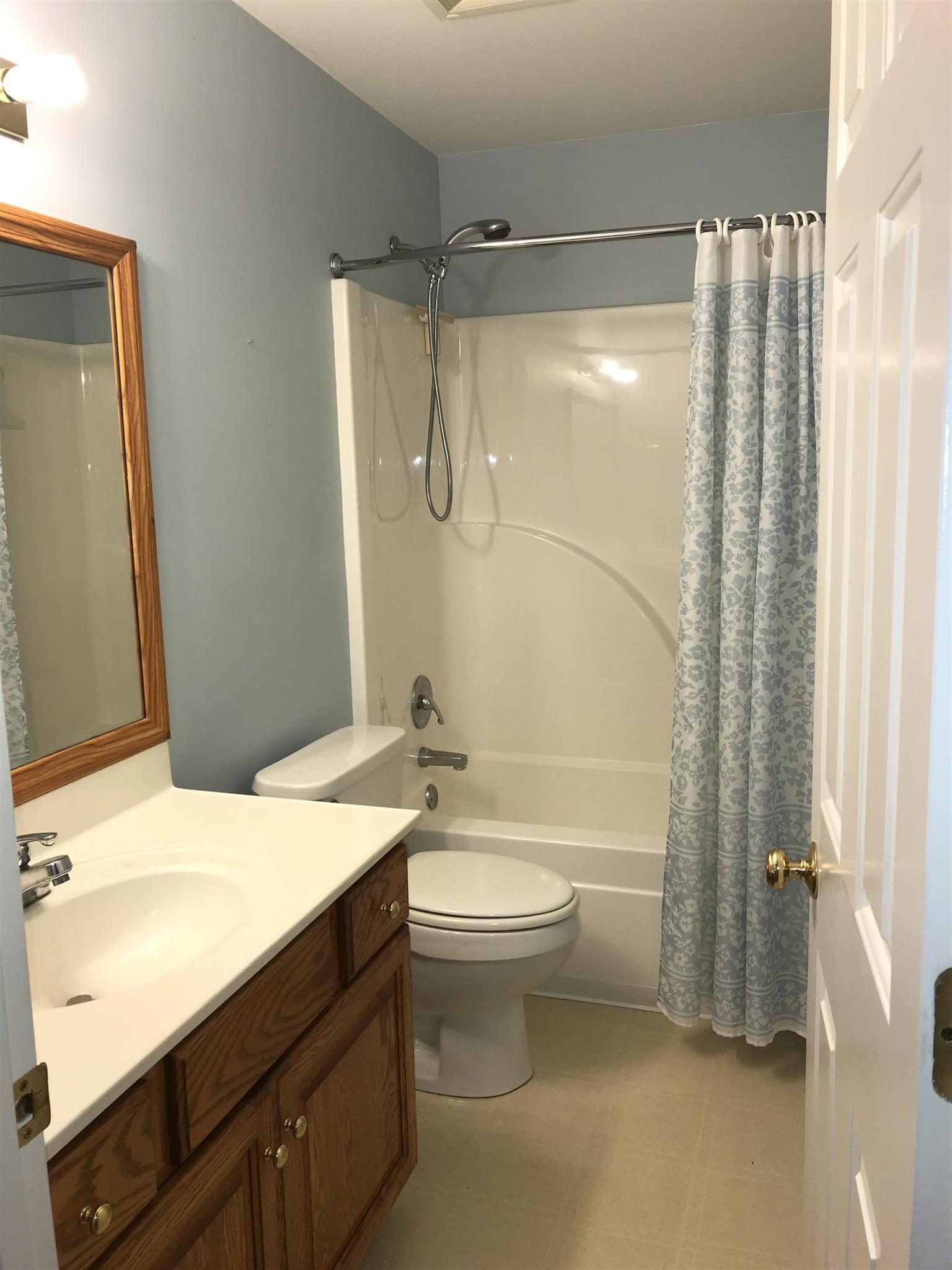349 Duck River Road Manchester, TN 37355 - Photo 5 of 18 a bathroom with a sink a toilet and shower