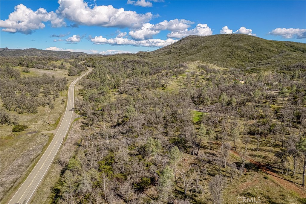 23523 Morgan Valley Road Lower Lake, CA 95457 - Photo 20 of 45 a view of a dry yard with mountains