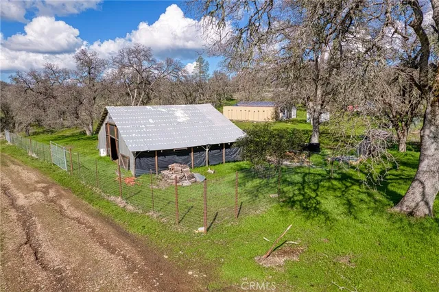 a view of a yard with an outdoor space