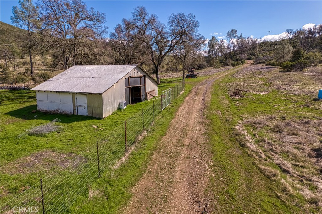 23523 Morgan Valley Road Lower Lake, CA 95457 - Photo 29 of 45 a view of a house with a yard