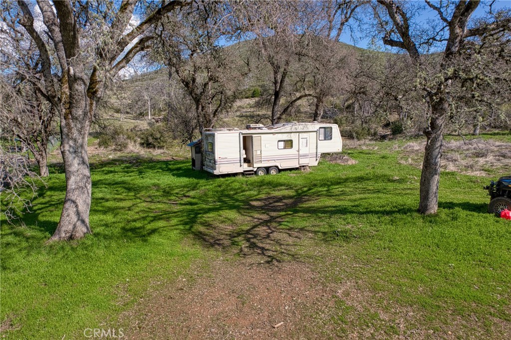 23523 Morgan Valley Road Lower Lake, CA 95457 - Photo 31 of 45 a view of a house with a yard