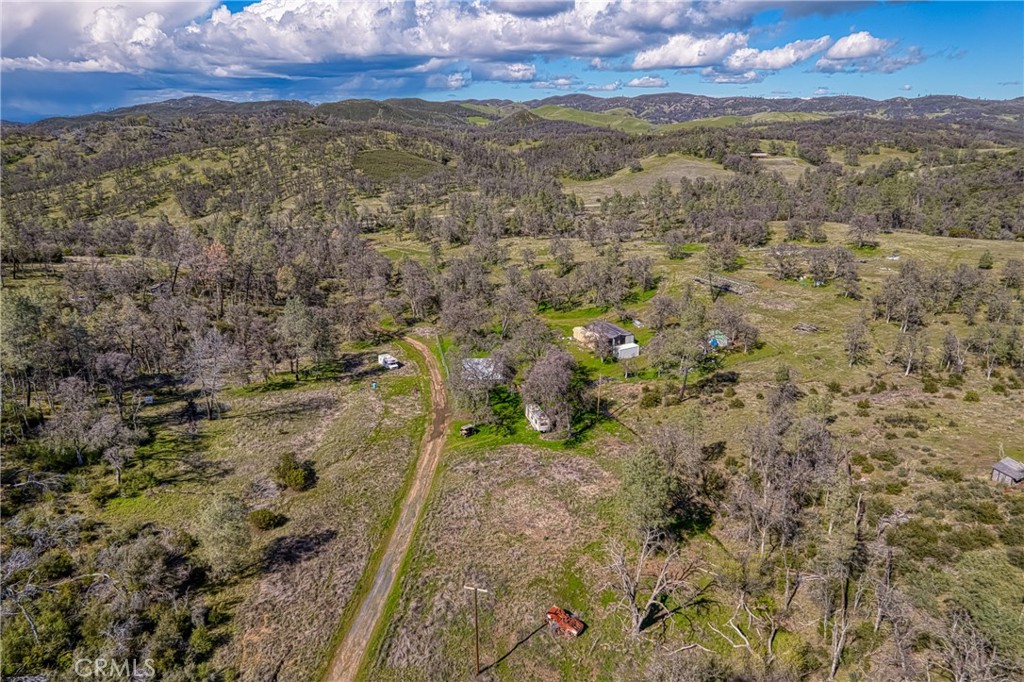 23523 Morgan Valley Road Lower Lake, CA 95457 - Photo 36 of 45 a view of a pathway next to a yard