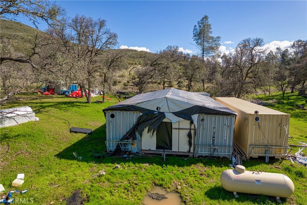23523 Morgan Valley Road Lower Lake, CA 95457 - Photo 5 of 45 a front view of a house with garden