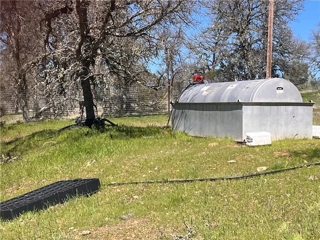 a view of a back yard of the house