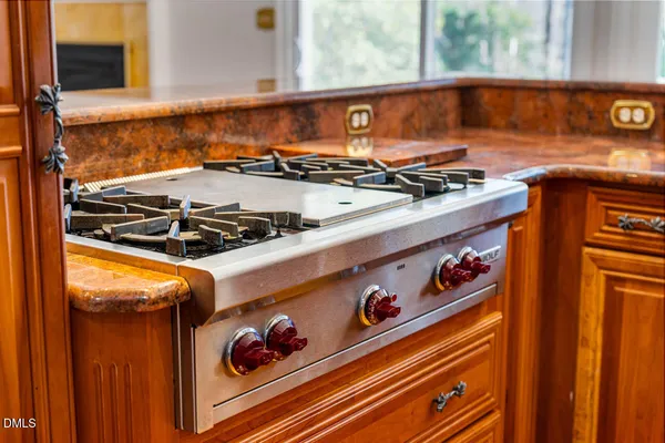a view of a livingroom with a ceiling fan and window