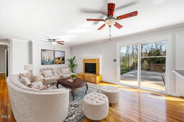 a kitchen with stainless steel appliances granite countertop a sink counter space cabinets and a large window