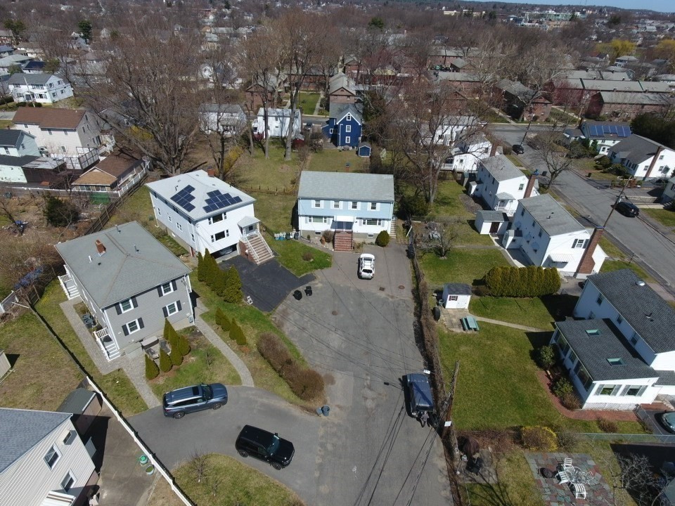 10-12 Norcross Circle Arlington, MA 02474 - Photo 27 of 31 an aerial view of a houses with outdoor space