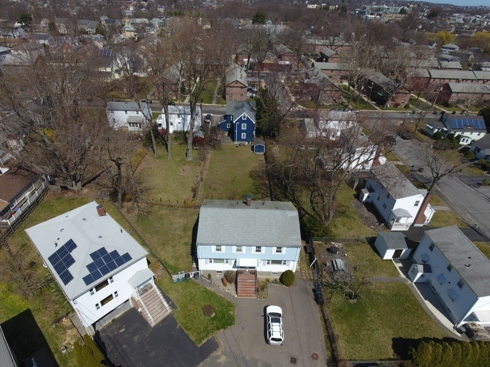 10-12 Norcross Circle Arlington, MA 02474 - Photo 28 of 31 an aerial view of a house with outdoor space