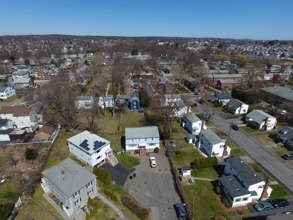 10-12 Norcross Circle Arlington, MA 02474 - Photo 4 of 31 an aerial view of a city with lots of residential buildings