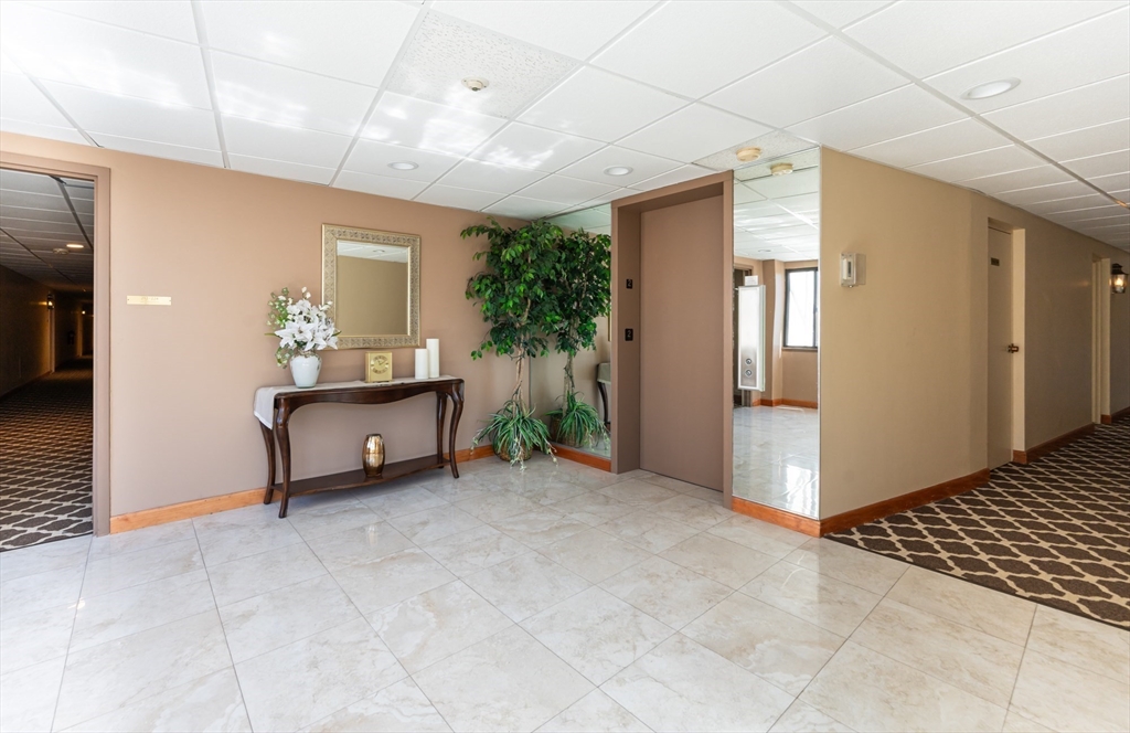 9 Broadway, Unit 223 Saugus, MA 01906 - Photo 14 of 18 a living room with furniture