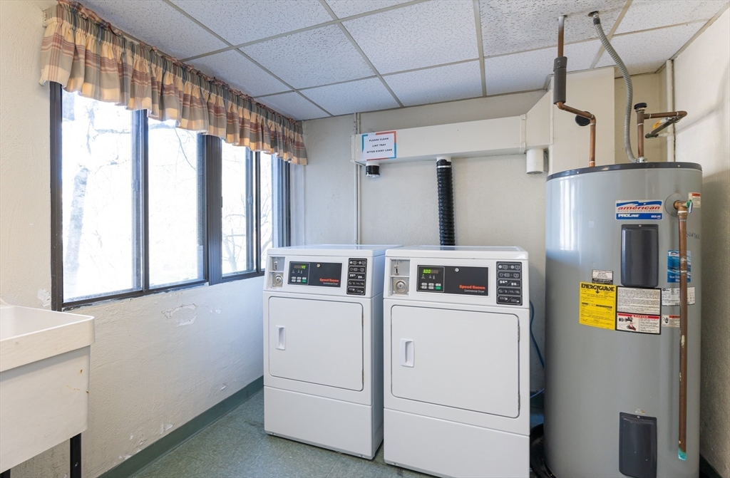 9 Broadway, Unit 223 Saugus, MA 01906 - Photo 16 of 18 a utility room with dryer and washer