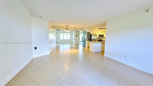 a view of a kitchen with a sink