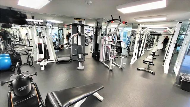 a room with furniture and a large window