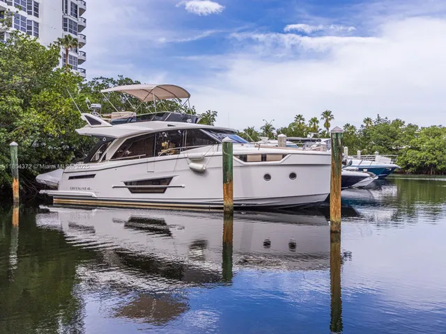 a living room with furniture and a mirror