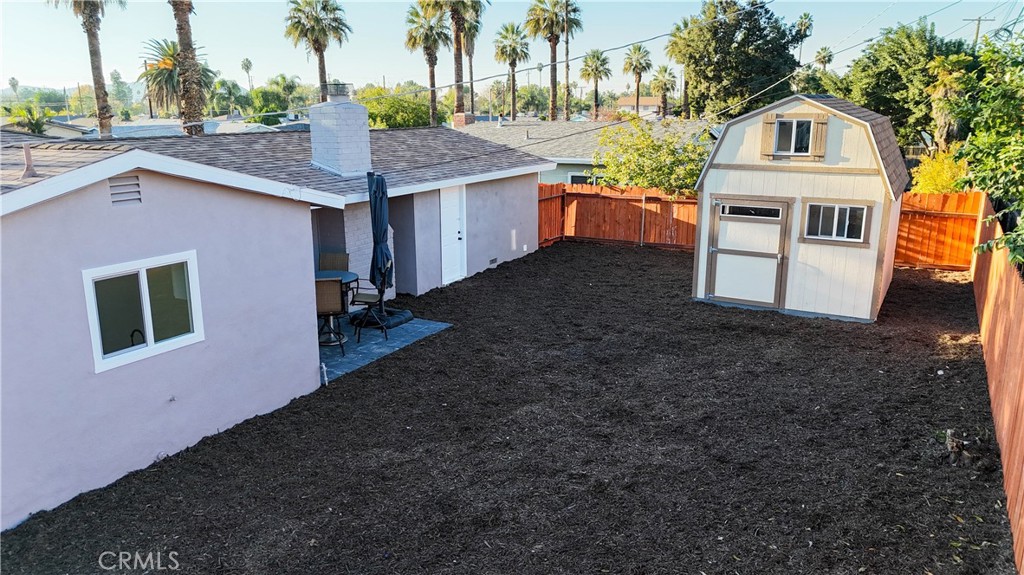 4065 Madrona Road Riverside, CA 92504 - Photo 24 of 35 a front view of a house with a garden