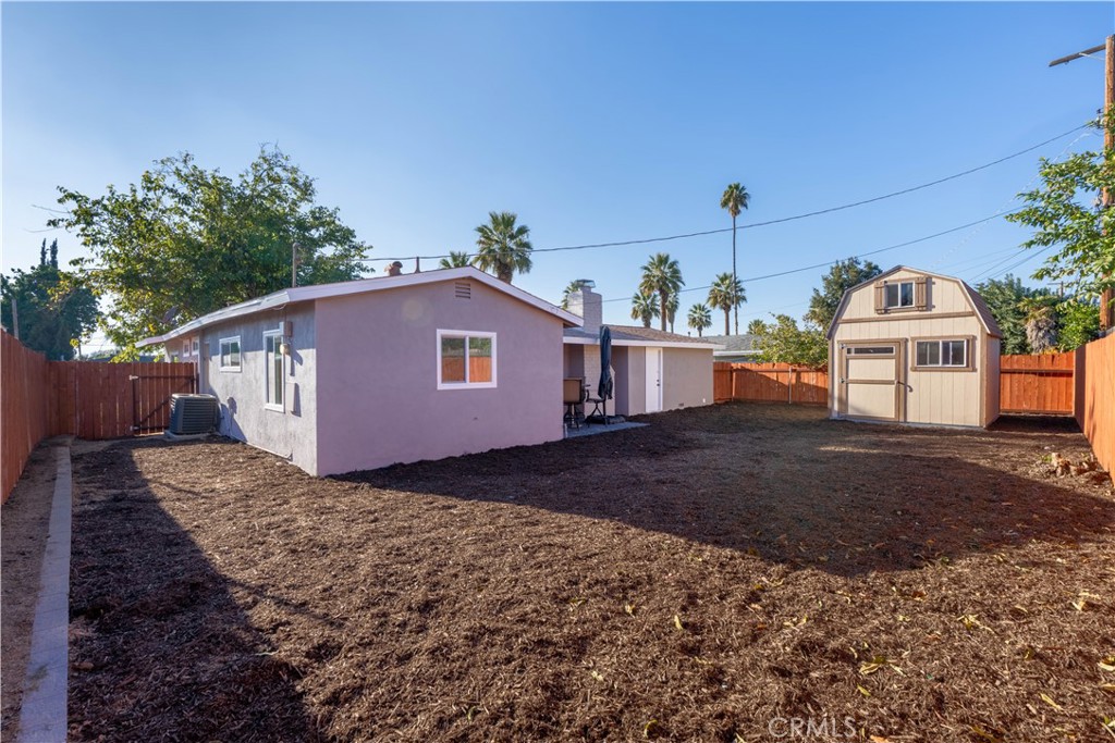 4065 Madrona Road Riverside, CA 92504 - Photo 26 of 35 a view of a house with a yard