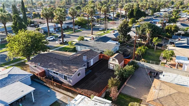 an aerial view of a house with a garden