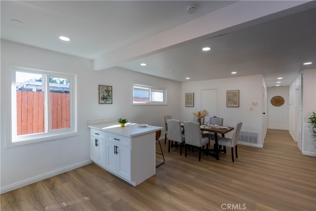 4065 Madrona Road Riverside, CA 92504 - Photo 9 of 35 a workspace with furniture window and wooden floor