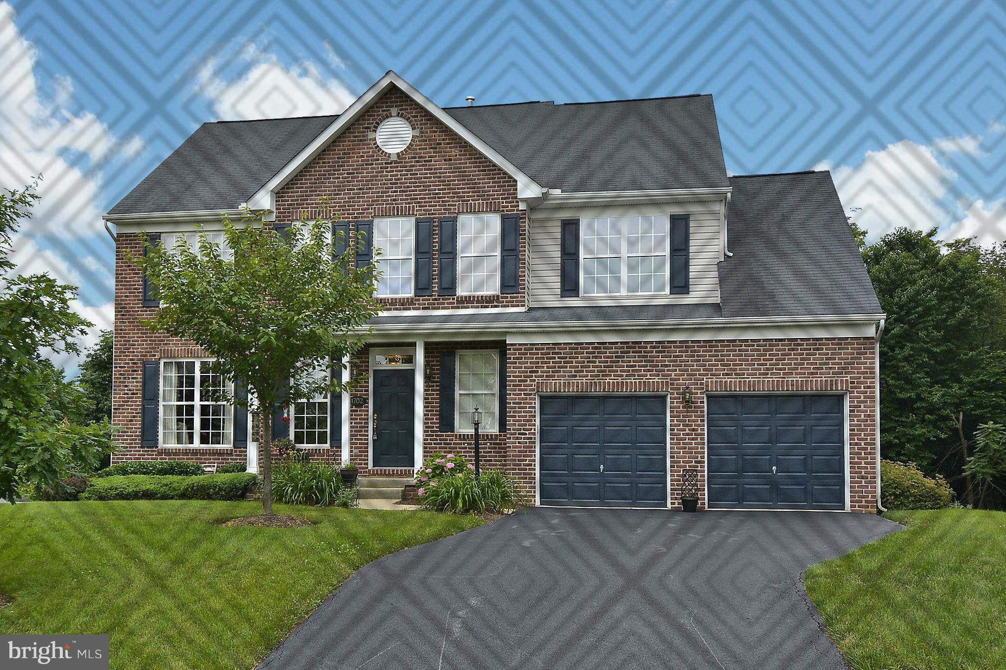 1702 Crommelins Court Point of Rocks, MD 21777 - Photo 1 of 12 a front view of a house with a garden