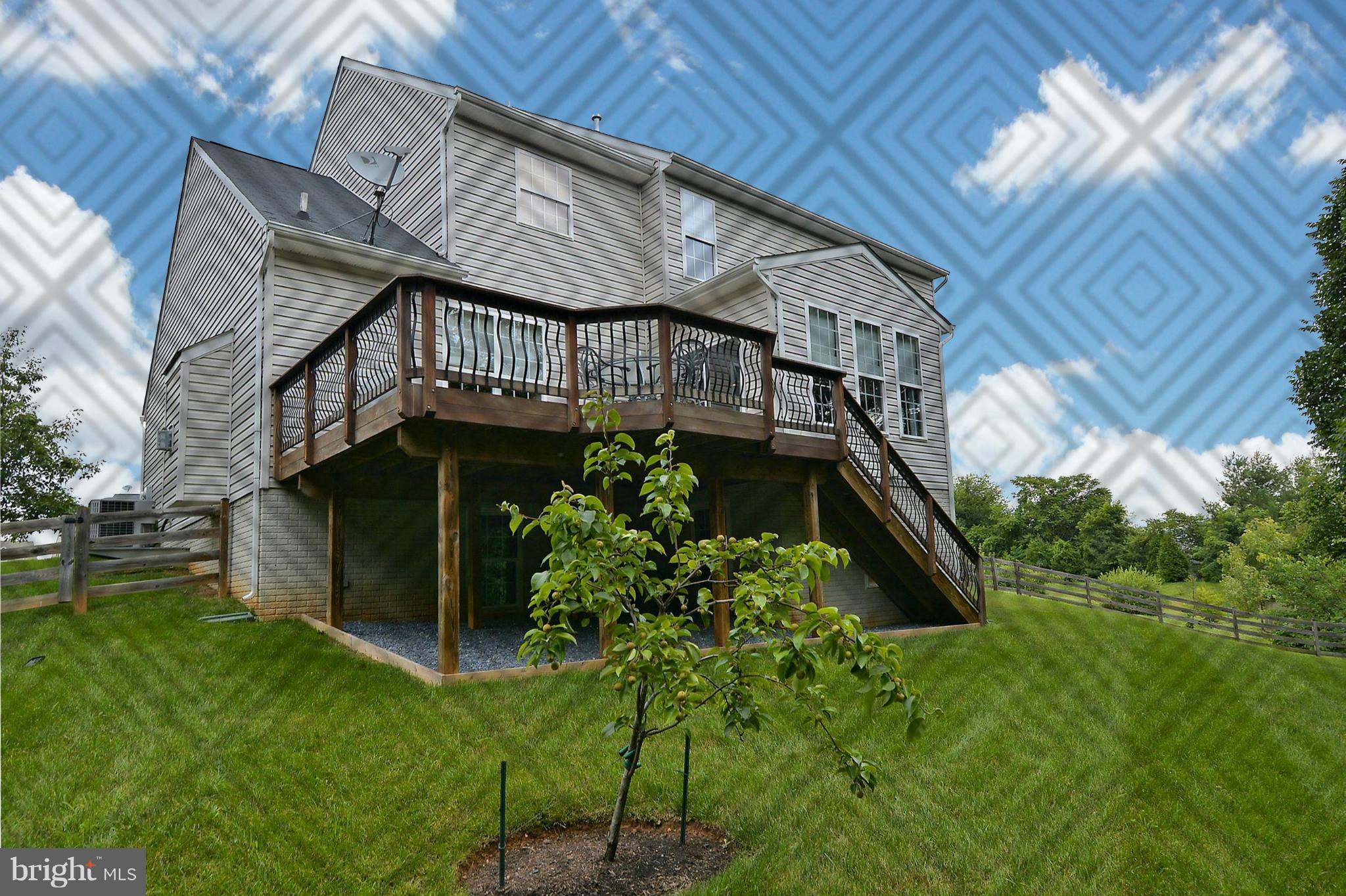 1702 Crommelins Court Point of Rocks, MD 21777 - Photo 11 of 12 a view of a house with a yard