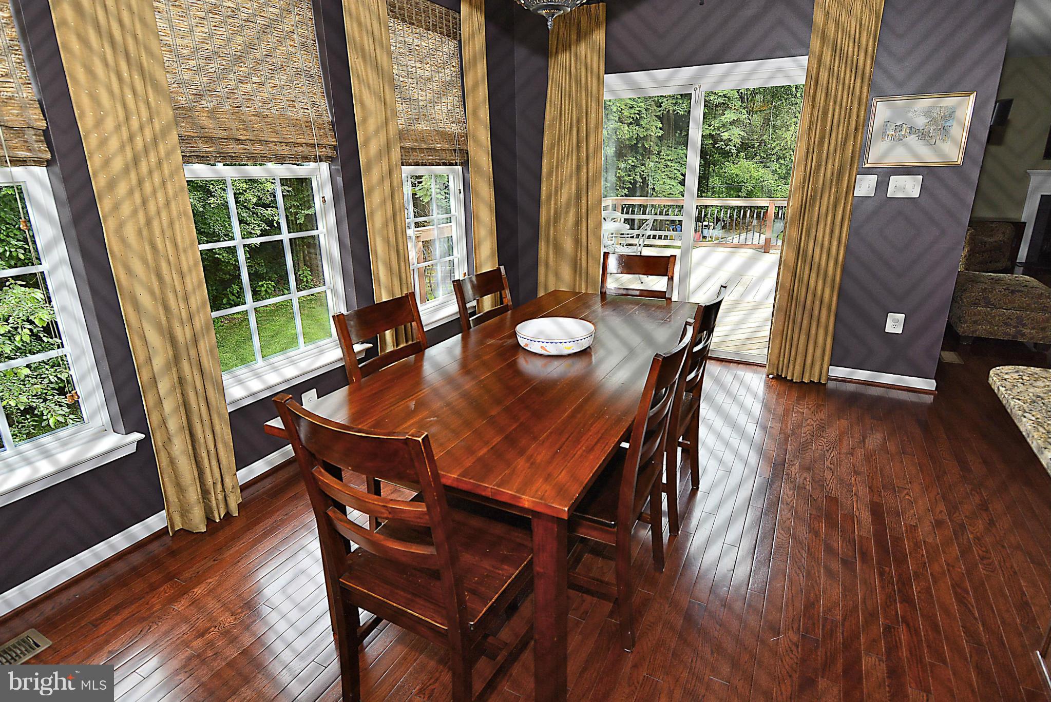 1702 Crommelins Court Point of Rocks, MD 21777 - Photo 6 of 12 a view of a dining room with furniture window and wooden floor