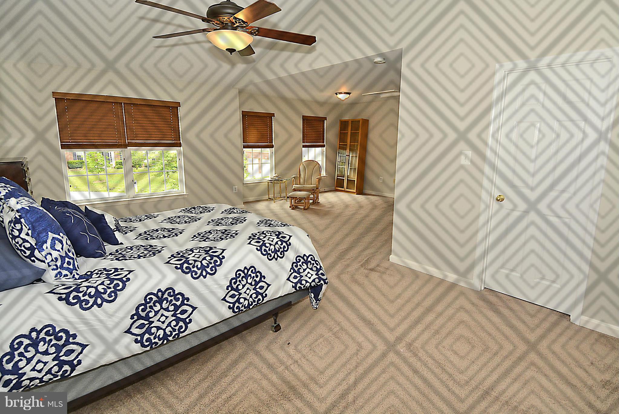 1702 Crommelins Court Point of Rocks, MD 21777 - Photo 8 of 12 a bedroom with a bed mirror and window